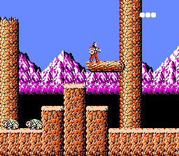 Rygar (NES) screenshot: Looking at those pesky green turtles from above, enjoying the nice purple mountains