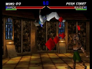 Mortal Kombat 4 (Nintendo 64) screenshot: Raiden taking an uppercut from Jarek.