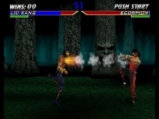 Mortal Kombat 4 (Nintendo 64) screenshot: Scorpion eating a fireball to the face (almost).