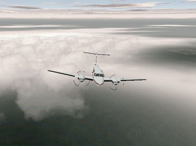 Pro Pilot '99 (Windows) screenshot: At altitude in the King Air 200 - nice clouds.