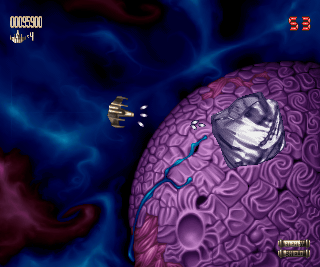 Super Stardust (Amiga) screenshot: Like Asteroids, larges stones are shot into smaller pieces.