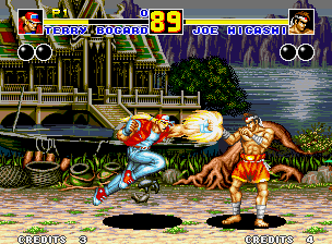 Fatal Fury 2 (Neo Geo) screenshot: Time is crucial. Will Joe Higashi be able to avoid getting hit by Terry Bogard's Burn Knuckle, or will he fall victim to its great power?