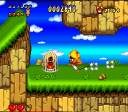 Speedy Gonzales in Los Gatos Bandidos (SNES) screenshot: One of the poor mice, trapped in a cage