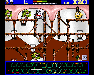Harald Hårdtand: Kampen om de rene tænder (Amiga) screenshot: Fight with green floppers and yellow muncher