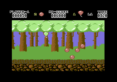 Hoppin' Mad (Commodore 64) screenshot: Get ten of these balloons to reach the next environment