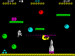 Jetpac (ZX Spectrum) screenshot: Third, defend yourself against various hostile forms