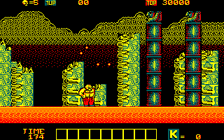 Karnov (Amstrad CPC) screenshot: Knock down these towers to continue...