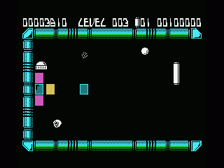 Krakout (MSX) screenshot: Hitting a block that contains a letter give bonuses, like a double size bat to return the ball