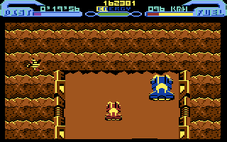L.E.D. Storm (Commodore 64) screenshot: A gap in the road, better jump!