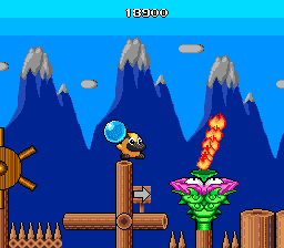 Liquid Kids (TurboGrafx-16) screenshot: An evil plant spits out fire