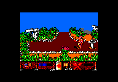 Los Inhumanos (Amstrad CPC) screenshot: I defeated an enemy. There is a grave with a cross.