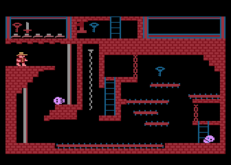 Montezuma's Revenge (Atari 8-bit) screenshot: Those poles make me feel like a Ghostbuster