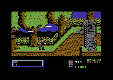 Midnight Resistance (Commodore 64) screenshot: Strange laser firing machine