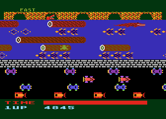 Frogger (Atari 8-bit) screenshot: On a log attempting to cross the river (Parker cartridge version)