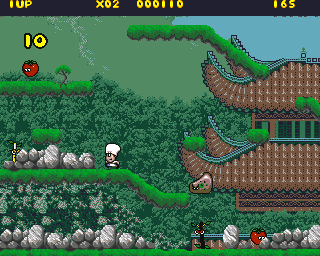 Pierre le Chef is... Out to Lunch (Amiga) screenshot: China - running away from the chef eater (level 5)