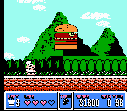 Panic Restaurant (NES) screenshot: The level 4 boss is a jumping hamburger.