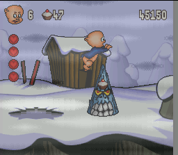 Porky Pig's Haunted Holiday (SNES) screenshot: Watch out for those giant ice things that pops up from below