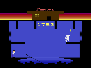 Porky's (Atari 2600) screenshot: I ended up back in the swamp. I don't need to build a ladder but I need to look out for Porky.