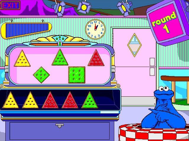 Sesame Street: Kindergarten (Windows) screenshot: Cookie Monster's Kooky Cookie Activity: Cookie monster lays out his cookies to form a pattern and it's the player's job to complete the pattern by selecting from the bottom row