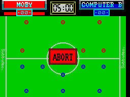 Subbuteo (ZX Spectrum) screenshot: The player is selected by scrolling through the team with the Z / X keys. The currently selected player's symbol flashes. Selection can be aborted & restarted