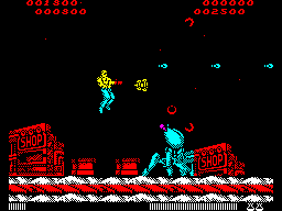 Forgotten Worlds (ZX Spectrum) screenshot: Now I shoot blue things ahead and red things at 45 degree angles. New bad guys ahead
