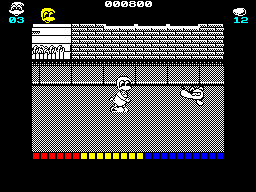Dynamite Düx (ZX Spectrum) screenshot: Dogs score 200 points. Egg weapon collected, 12 shots show in the top right