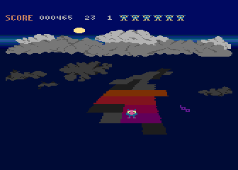 Rainbow Walker (Atari 8-bit) screenshot: Coloring the rainbow during the day
