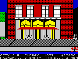 Ghostbusters (ZX Spectrum) screenshot: A "Slimer" in a box being transported to the car. There are still 3 available traps. (128K)