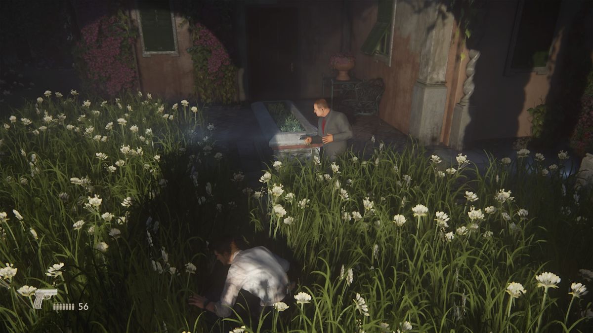 Uncharted 4: A Thief's End (PlayStation 4) screenshot: Using tall grass to remain unnoticed