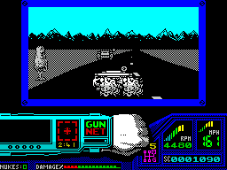 Techno Cop (ZX Spectrum) screenshot: The driving bit is fine. The player gets points for shooting up any car on the road. Here Technocop is driving through the wreckage of one such car
