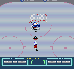 Pro Sport Hockey (SNES) screenshot: The goalie makes a save