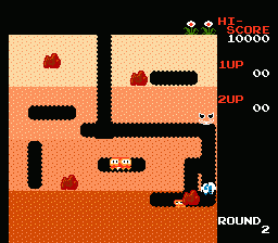 Dig Dug (NES) screenshot: Squashing with a rock