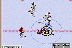 NHL 2002 (Game Boy Advance) screenshot: Another crushing hit at center ice.