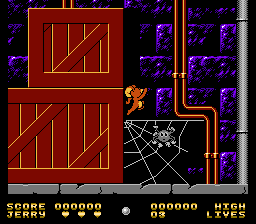 Tom & Jerry (NES) screenshot: The spider web will slow Jerry down