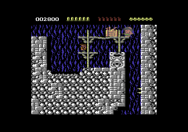 Rick Dangerous (Commodore 64) screenshot: Collect the box to reload your gun