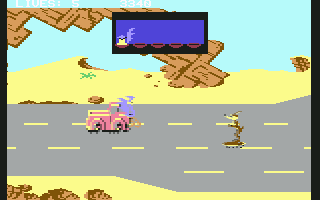 Road Runner (Commodore 64) screenshot: I also need to avoid trucks but I get points if I get Wile E. ran over