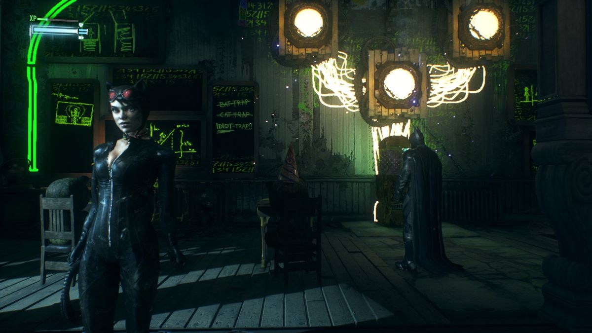 Batman: Arkham Knight (PlayStation 4) screenshot: Catwoman and Batman in Riddler's hideout