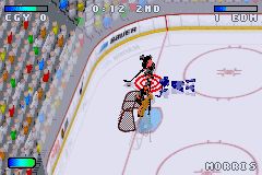 NHL Hitz 20-03 (Game Boy Advance) screenshot: Morris flattens one of Edmonton's finest with a teeth-rattling body check!
