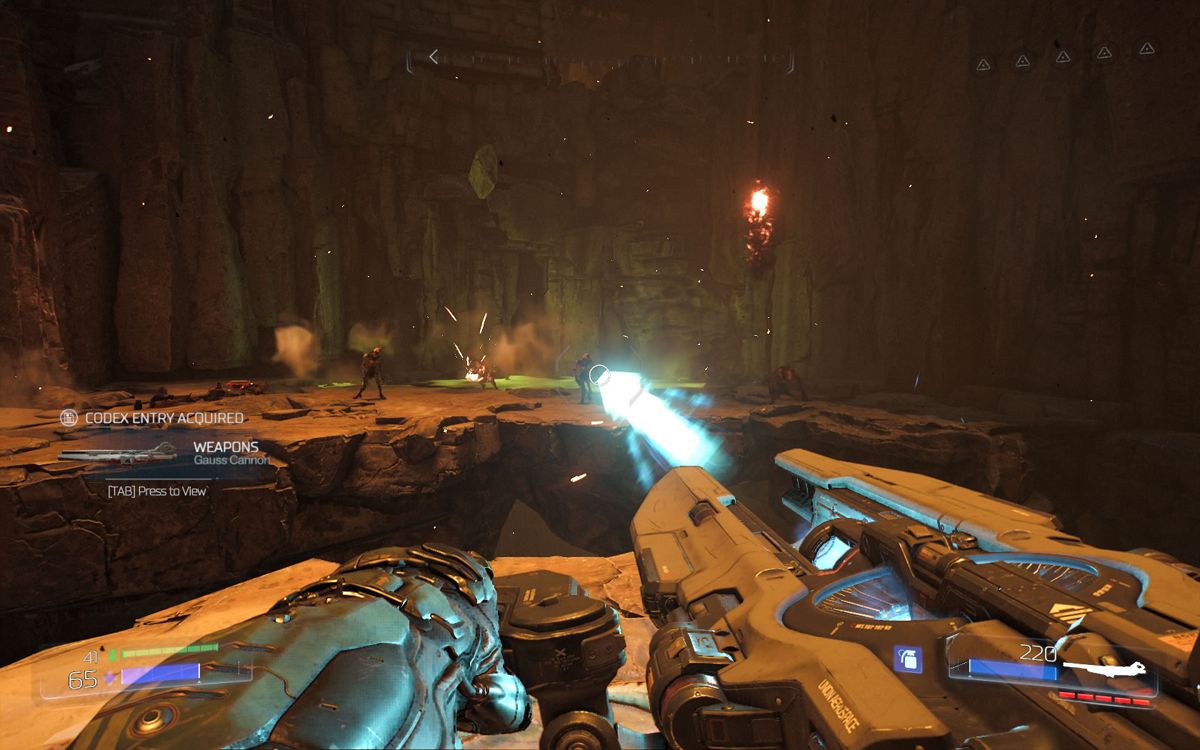 Doom (Windows) screenshot: Firing the gauss gun at some weak enemies in the distance.