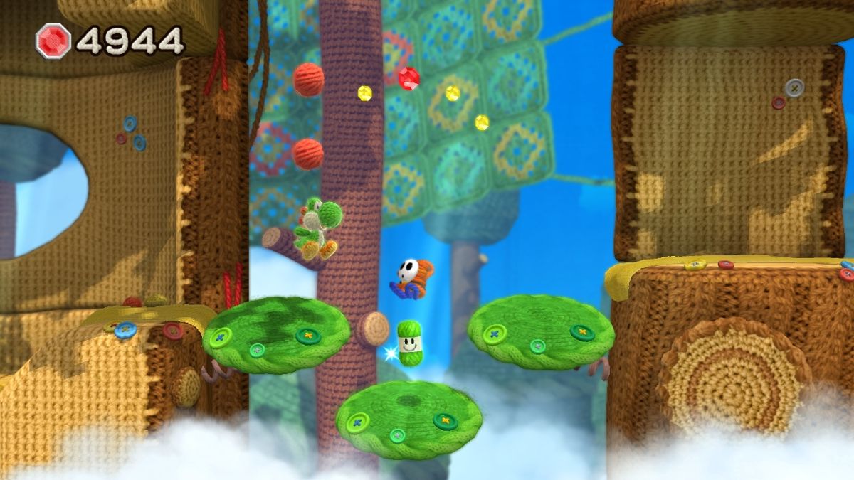 Yoshi's Woolly World (Wii U) screenshot: Hopping around in the Trees of World 1-2