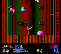 Wizards & Warriors (NES) screenshot: Explore inside the giant trees.