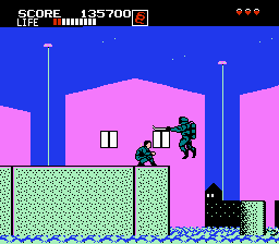 Shinobi (NES) screenshot: Those ninjas will jump suddenly off the watter. Duck to avoid their attacks.