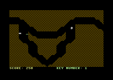 The Adventurer (Commodore 64) screenshot: These maze of passages resemble a giant mouth, doesn't it?