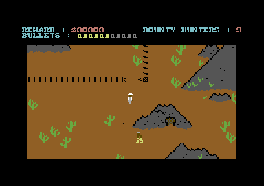 A Fi$tful of Buck$ (Commodore 64) screenshot: Out in the desert