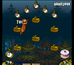 Adventures of Yogi Bear (SNES) screenshot: Instead of crossing an incomplete wooden bridge, Yogi Bear uses some Picnic baskets... as shortcut!