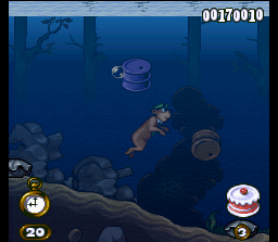 Adventures of Yogi Bear (SNES) screenshot: Now, Yogi finds a section where two menacing oil drums are floating usually: avoid it at all costs!