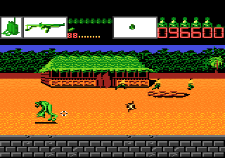 Alien Brigade (Atari 7800) screenshot: An alien runs by while prisoners escape