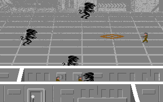 Aliens: The Computer Game (Commodore 64) screenshot: In this stage Ripley must try to fend off as many aliens as possible
