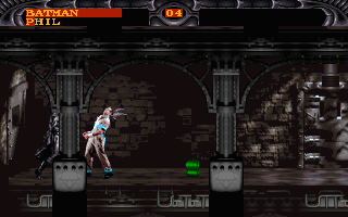 Batman Forever (DOS) screenshot: Phil gets a face full of bat fist.