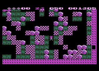 Boulder Dash (Atari 8-bit) screenshot: I found the exit, but accidentally blocked it with boulders!
